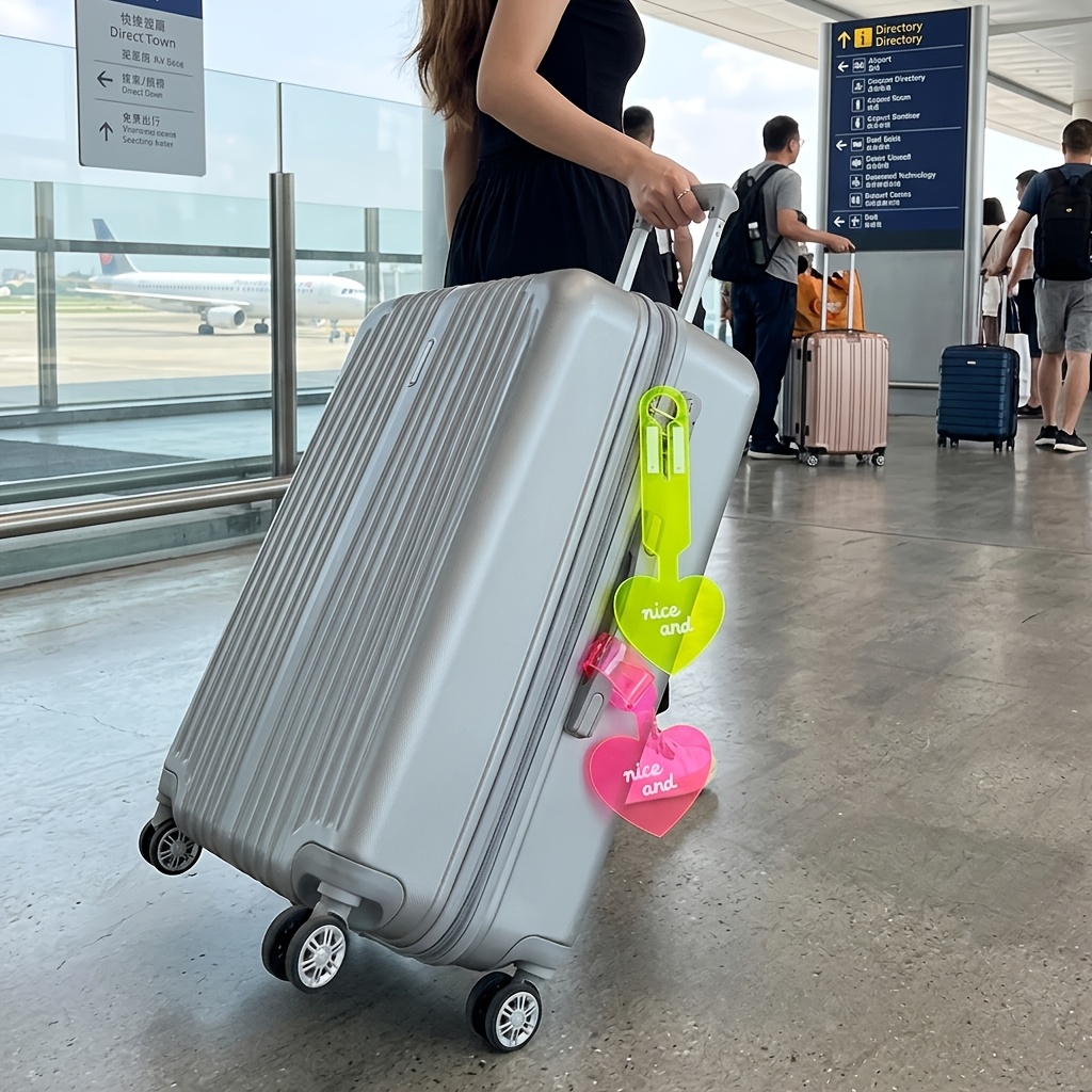 4개의 형광 하트 수하물 태그, 4가지 다양한 색상의  - Travel Accessories International 리뷰 및 가격